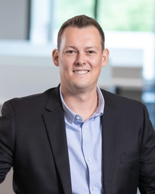 portrait of a smiling person in professional attire